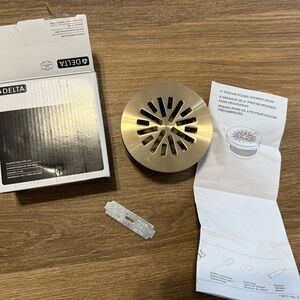 4” round Delta shower drain